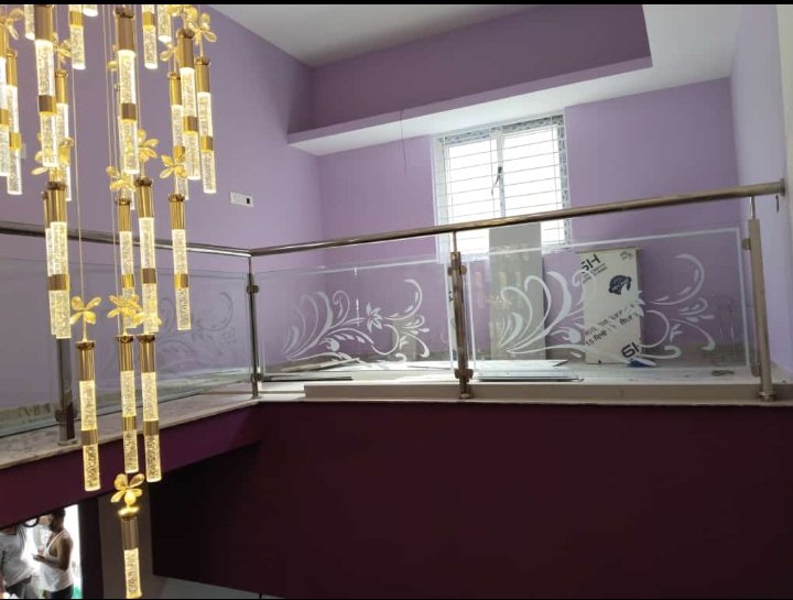 Etched glass railing — floral mezzanine