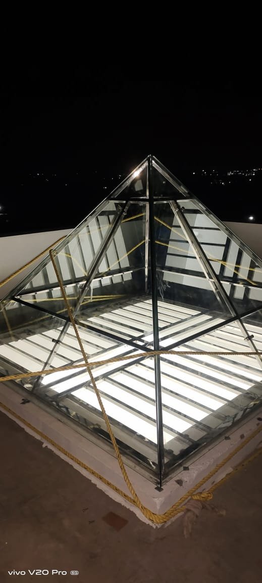 Roof sky glass — pyramid lantern night view