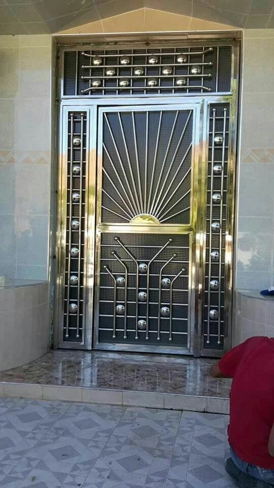 SS sunburst security door